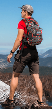 man wearing sharkmouth tactical backpack
